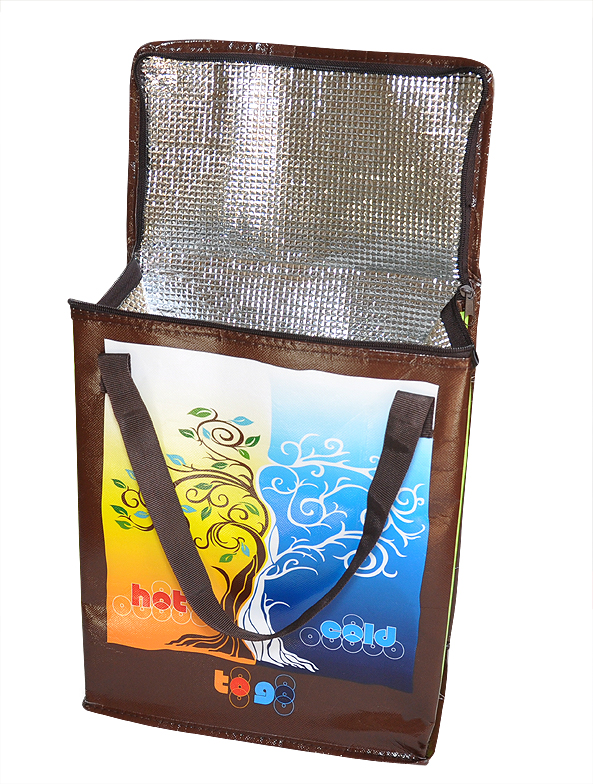 Open insulated hot and cold grocery bag showing a silver lining and colourful printed sides