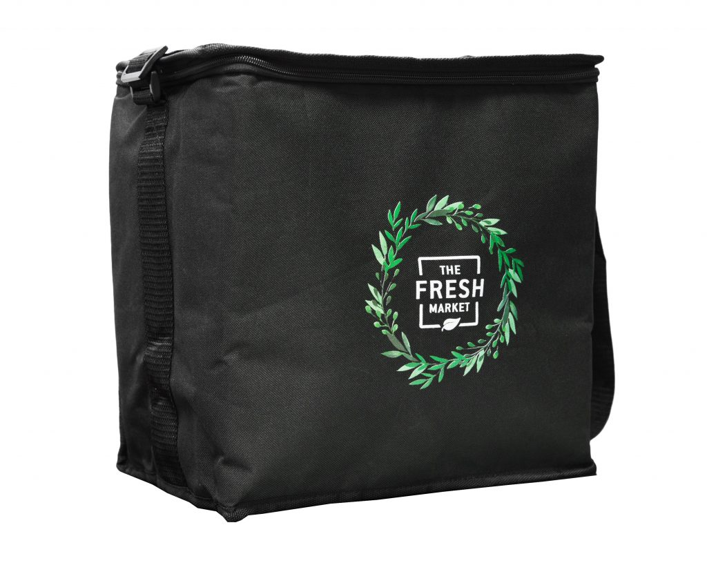 a black thermal delivery bag with a green leaf design