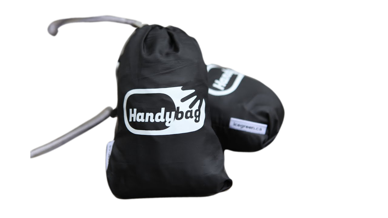 Black nylon drawstring stuff sacks with Handybag labels, shown packed and partially opened